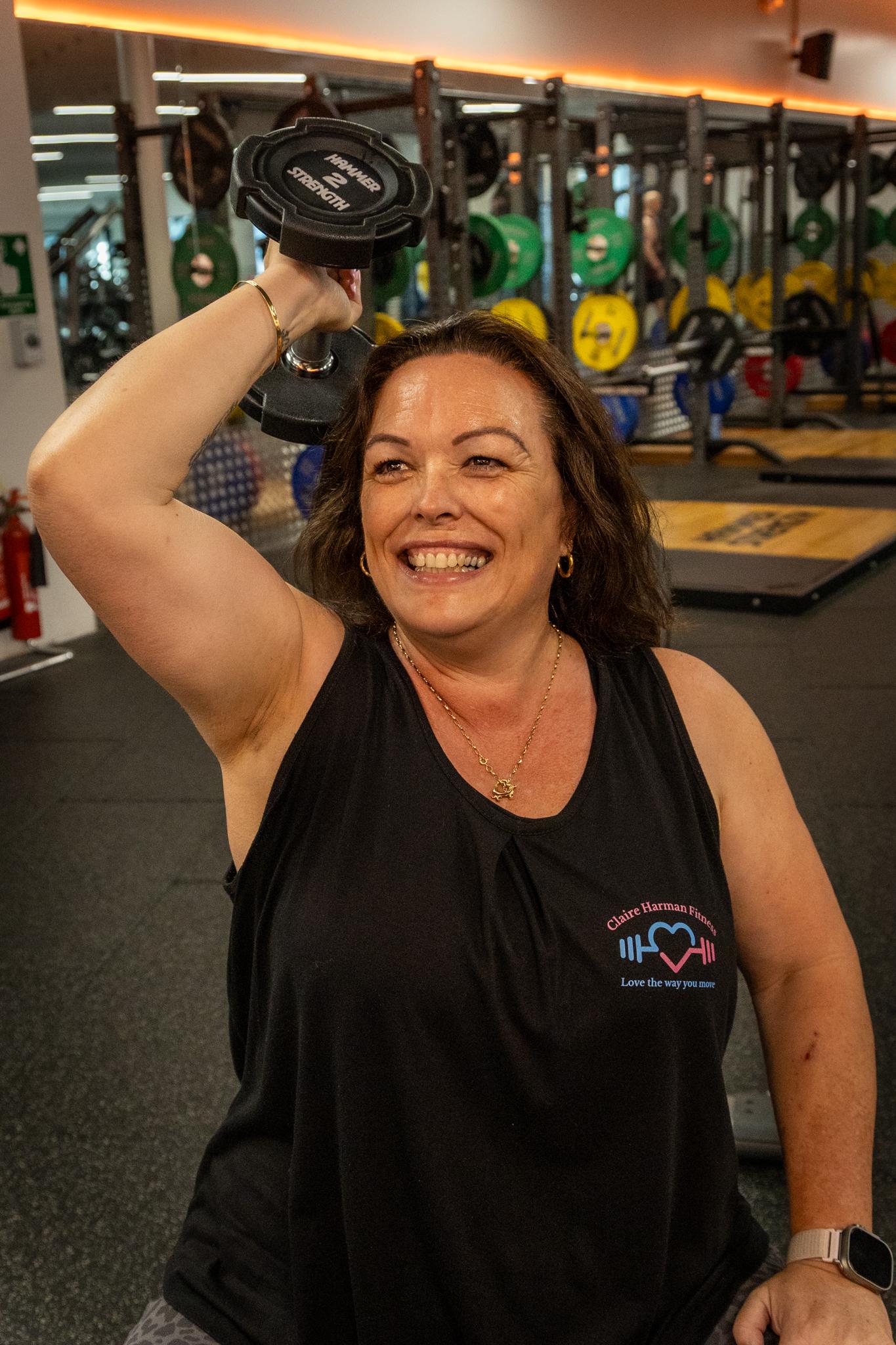 Claire training with dumbbells